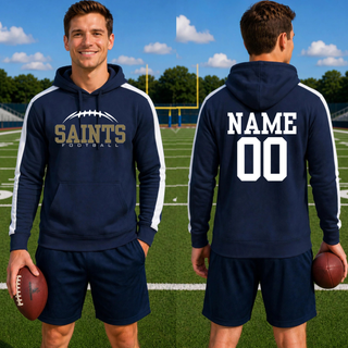 Model wearing a navy Topeka Saints Classic Football Laces hoodie with optional player name and number on the back
