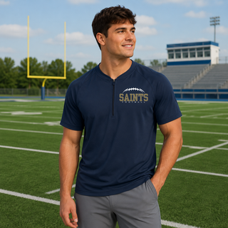 Model wearing a true navy half-zip short sleeve jacket with Topeka Saints Classic Football Laces left-chest design