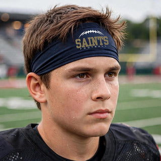 Football player wearing a true navy Topeka Saints Classic Football Laces performance headband on the field