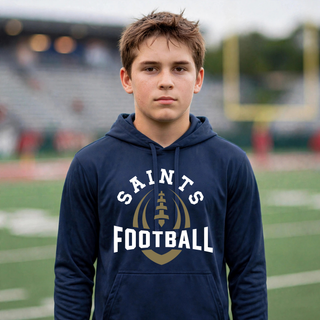 Deep navy Topeka Saints Football Outline performance fleece hoodie modeled on a football field