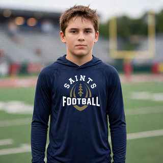 True navy Topeka Saints Football Outline PosiCharge Competitor hoodie modeled on a football field