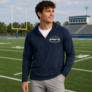 True navy Topeka Saints gridiron crest half-zip hooded jacket modeled on a football field