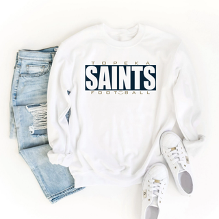 White Topeka Saints Varsity Block Football crewneck sweatshirt flat lay with jeans and white sneakers