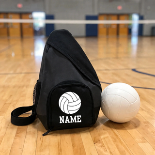Black personalized volleyball sling pack with name and volleyball graphic on a gym floor