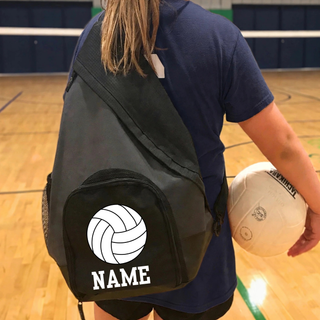Volleyball player wearing personalized sling pack on the court holding a volleyball