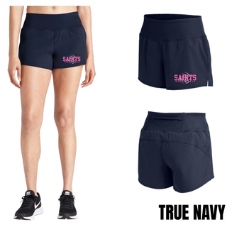 Woman wearing true navy Topeka Saints Volleyball Distressed Swirl Women's Repeat Short with sneakers