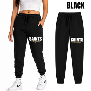 Woman wearing black Topeka Saints Volleyball Stacked Core Fleece jogger with sneakers
