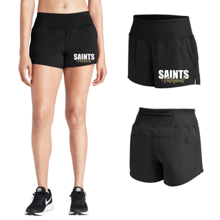 Woman wearing black Topeka Saints Volleyball Stacked Women's Repeat short front and back view