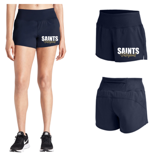 Woman wearing navy Topeka Saints Volleyball Stacked Women's Repeat short front and back view