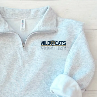 Close up flat lay of an ash grey heather Jerzees cadet collar quarter-zip with the Topeka Wildcats Wrestling Club Split Logo design on the left chest: Wild and Cats in navy lettering with a tan wildcat mascot head between them, a gold underline bar, and Wrestling in navy outlined lettering below.