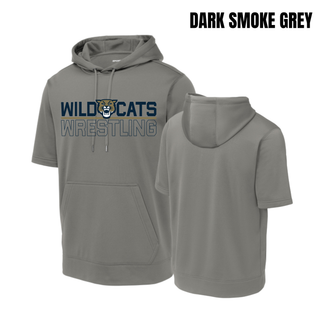 Dark smoke grey short sleeve hooded pullover with the Topeka Wildcats Wrestling Club split logo: Wild and Cats lettering side by side with a wildcat mascot head between them, a gold underline bar, and Wrestling in outlined lettering below. Front and back flat lay.