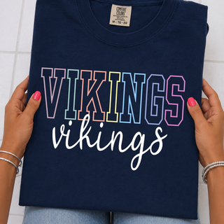 Navy Comfort Colors tee with pastel outline VIKINGS block text and white script vikings stacked design