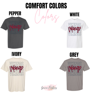 Vikings Stacked Script Top Comfort Colors tees in pepper, white, ivory, and grey
