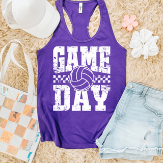 Purple racerback tank flat lay with distressed GAME DAY volleyball checkered graphic in white
