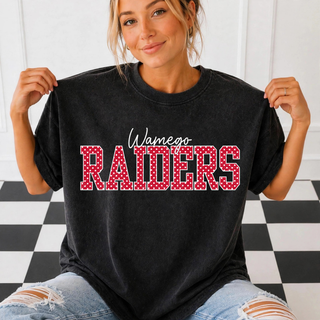 Black Wamego Raiders top with white cursive Wamego script and red polka dot RAIDERS block lettering with white outline