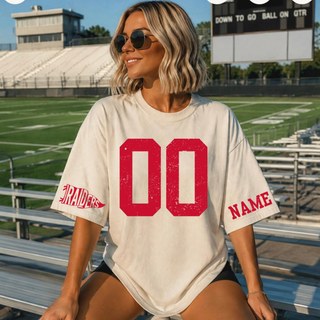 Sand tee with red distressed '00' number on front, 'RAIDERS' pennant flag icon and 'NAME' text on sleeves, custom number jersey top for Wamego Raiders