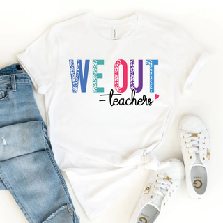 White tee flat lay with colorful leopard print WE OUT teachers script design with small heart detail
