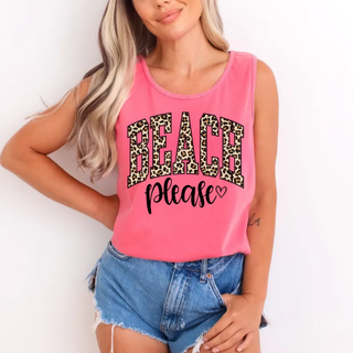 Woman wearing crunchberry tank top with beach please leopard varsity graphic and heart, lifestyle
