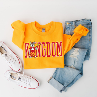 Wolf Mascot Kingdom Gold Crewneck Sweatshirt with red and white lettering, styled with jeans and sneakers